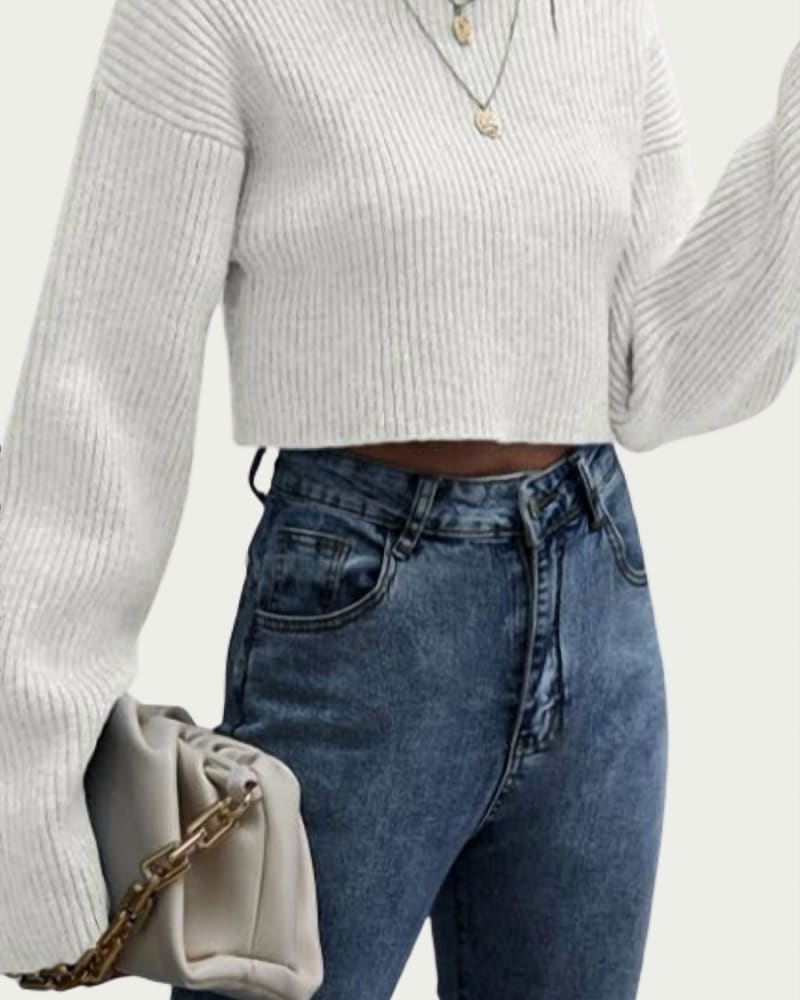 Front of a model wearing a size L Ribbed-Knit Cropped Turtleneck Sweater in Ivory in Ivory by TREND SHOP. | dia_product_style_image_id:334954